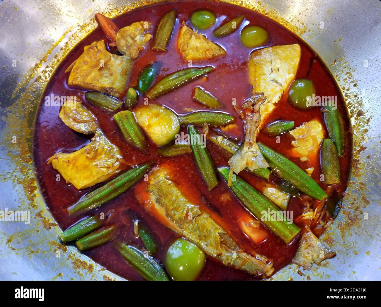 Spicy red curry with blue fish and okras Stock Photo Alamy