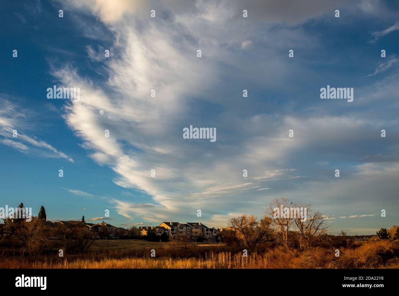 Sunset skies in the fall over the suburban neighborhood in Aurora ...