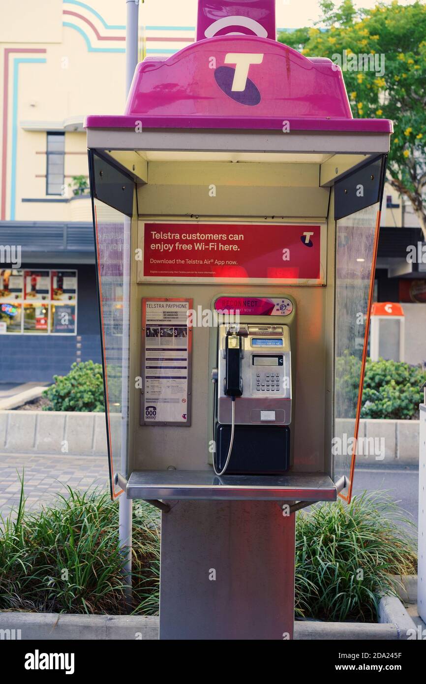 Mackay, Queensland, Australia - November 2019: Telstra still provides telephone boxes in the streets for the convenience of visitors without a mobile Stock Photo