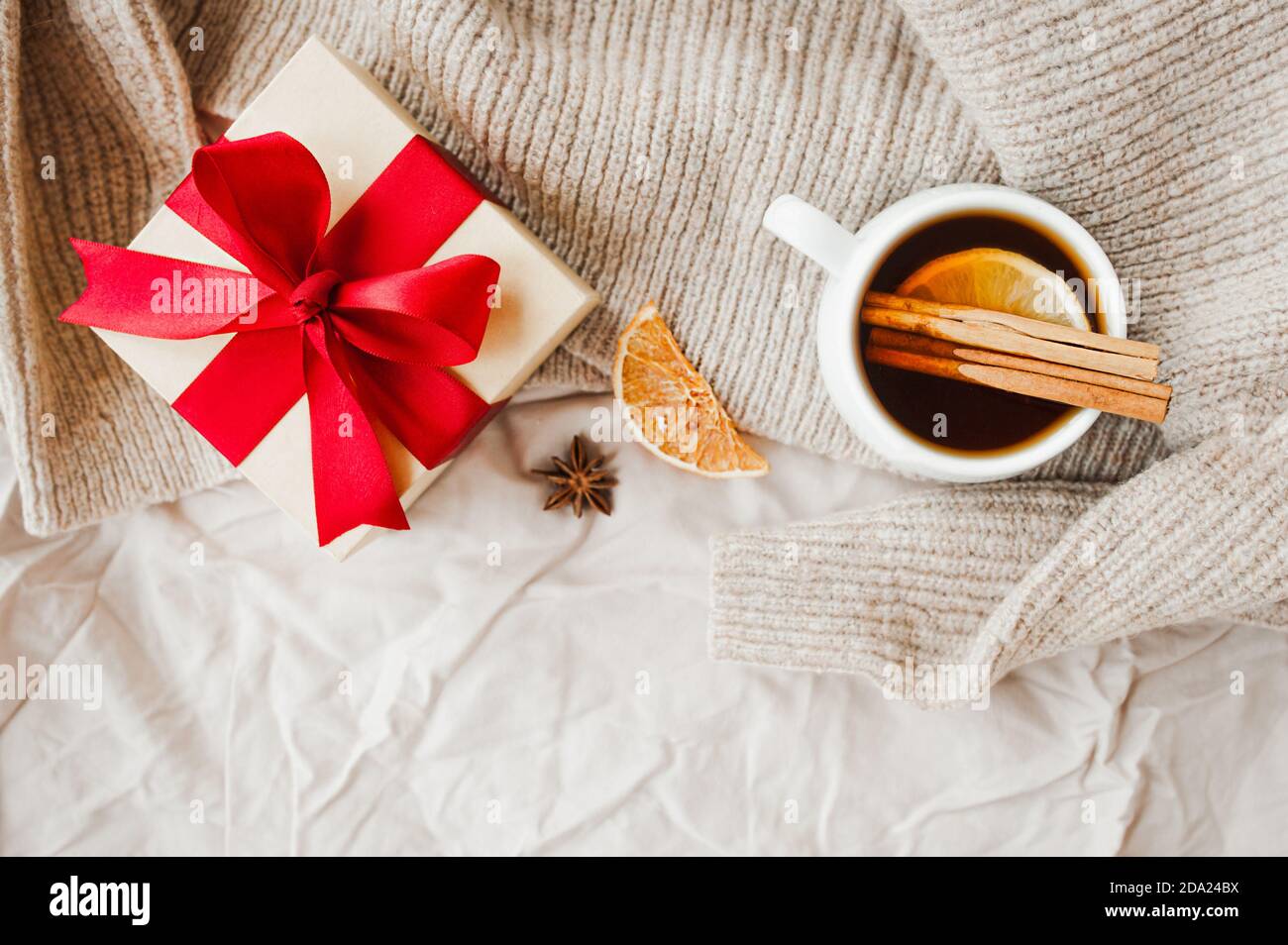 cozy Christmas hygge style card. porcelain tea cup with orange slice ...