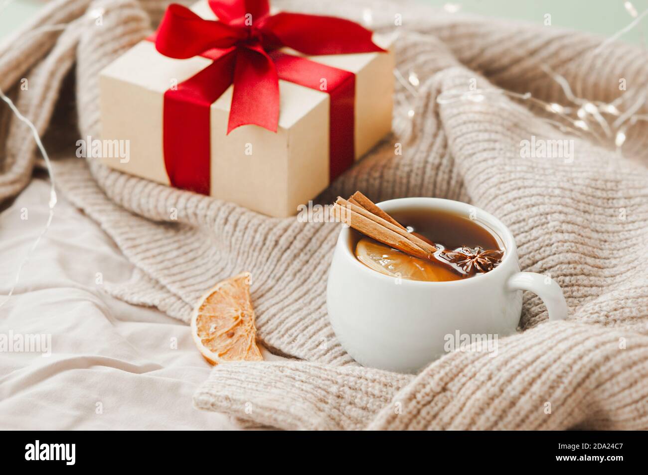 cozy Christmas hygge style card. porcelain tea cup with orange slice ...