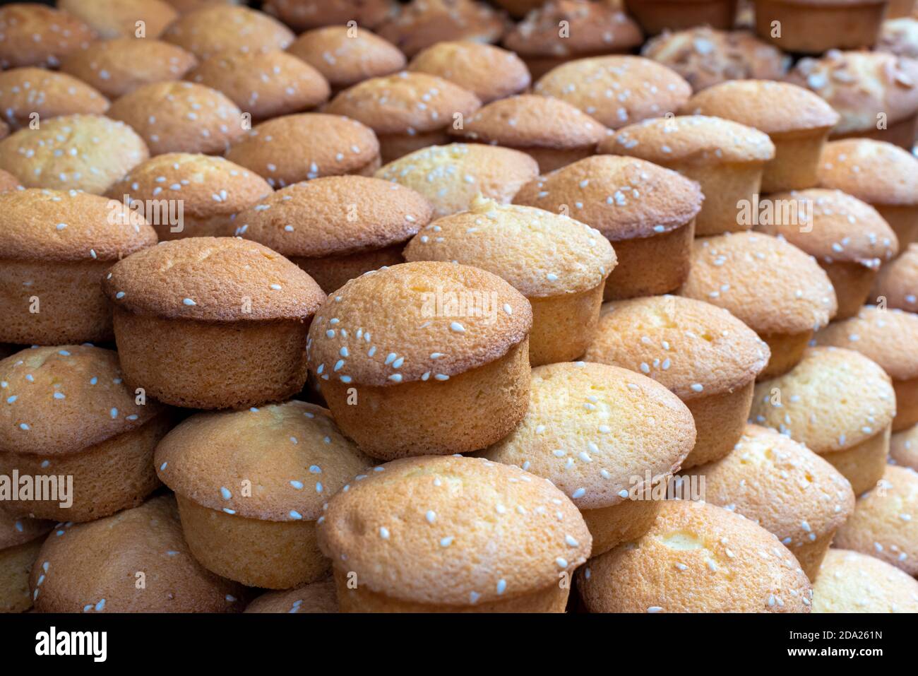 Chinese cakes heap in a street market in chengdu, Sichuan province, China Stock Photo