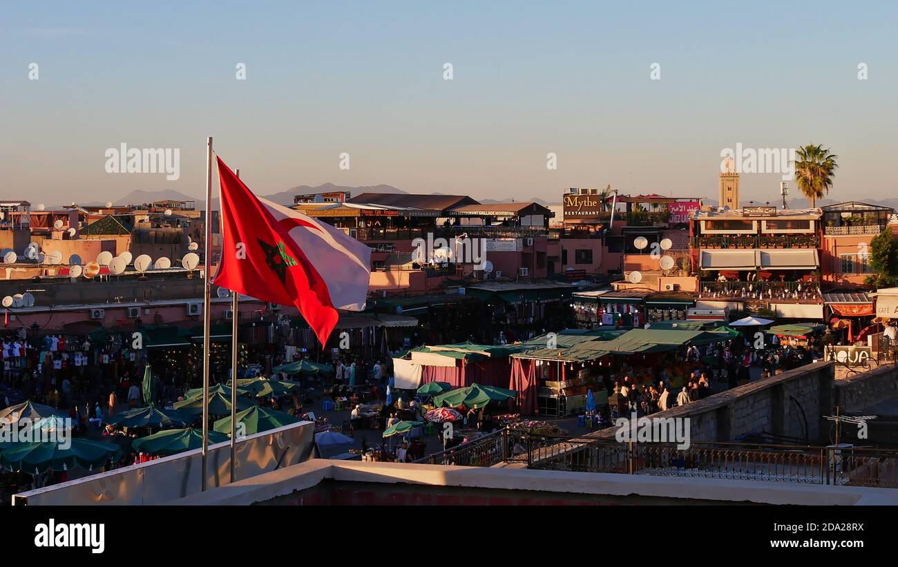Marrakesh, Morocco - 12/25/2019: Aerial view of the eastern part of popular square and tourist attraction Jemaa el-Fnaa in historic center (Medina). Stock Photo