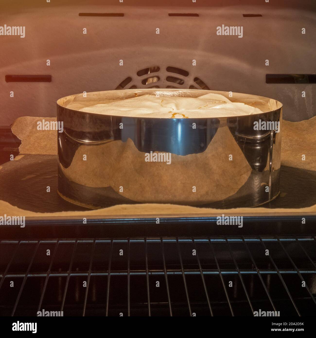 Cooking meringue cake in the oven, baking meringue in a culinary form