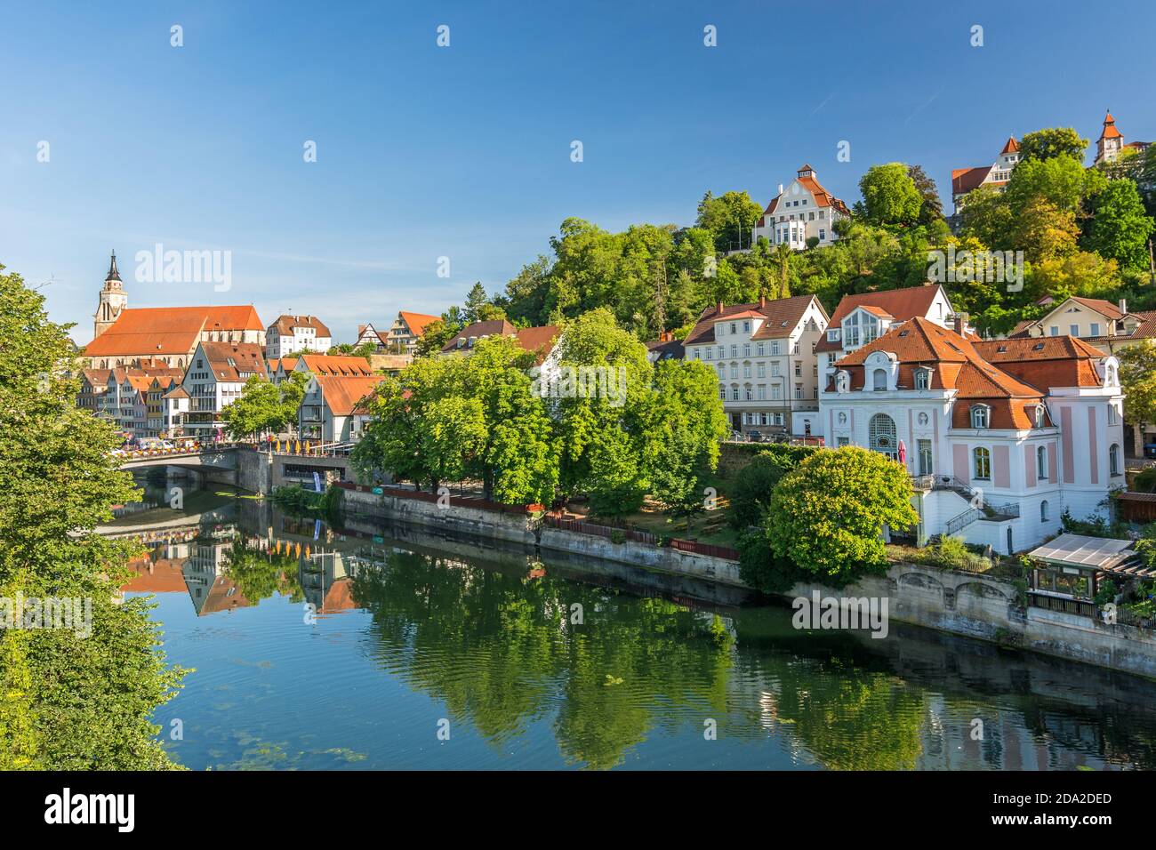 Historic villas along the Neckar river in the German city of Tübingen on a sunny day in summer Stock Photo