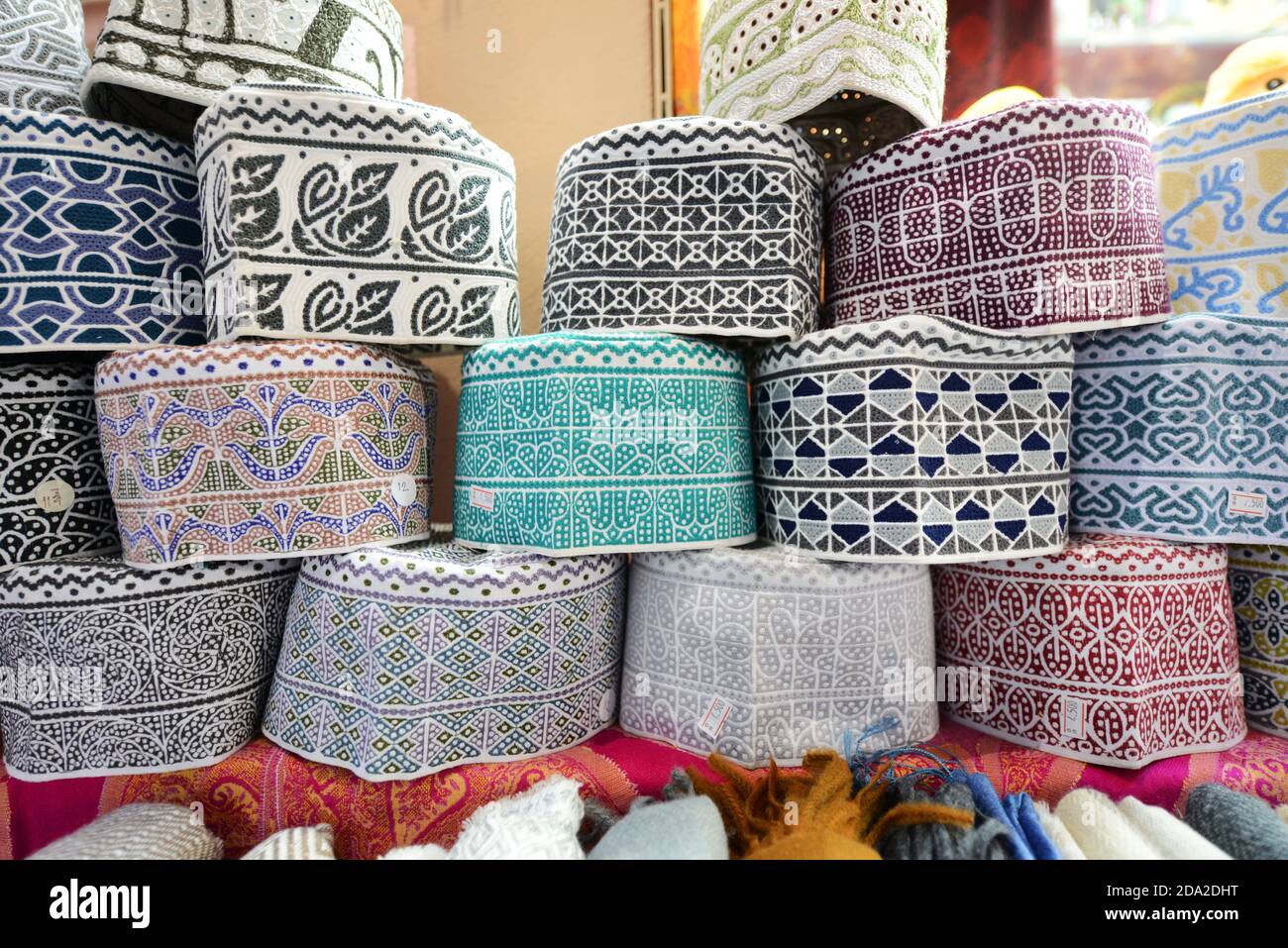 A traditional Omani hat ( Kuma ) shop at thevibrant souq in Mutrah, Oman  Stock Photo - Alamy