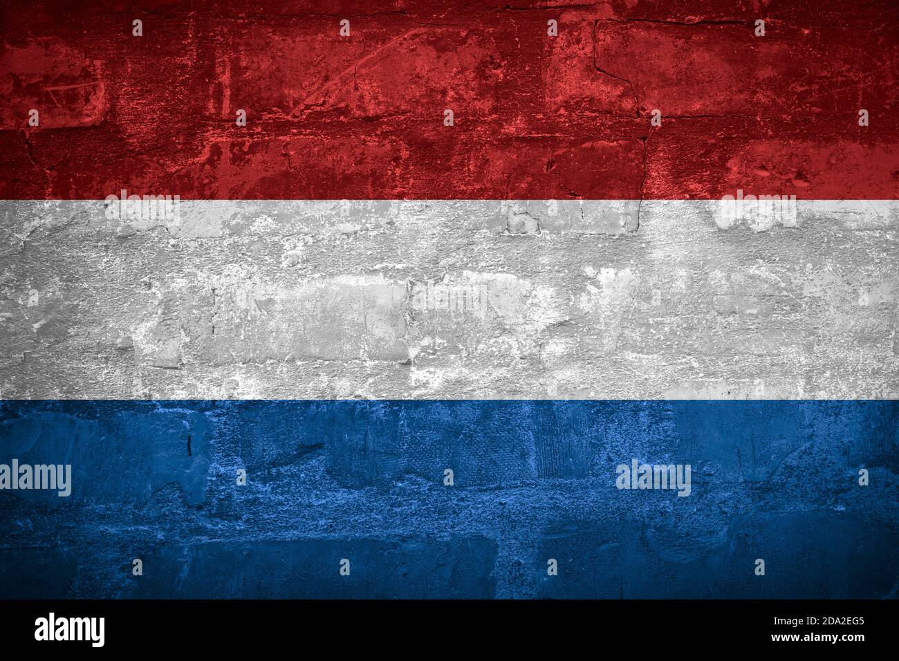 Flag of The Netherlands or Dutch banner on wall background, Holland Stock Photo