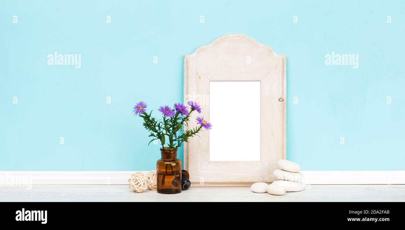 Download Banner Mockup Template With Rustic Vertical Wooden Blank Picture Frame And Copy Space Apothecary Bottle With Purple Daisy Flowers And White Pebbles Stock Photo Alamy