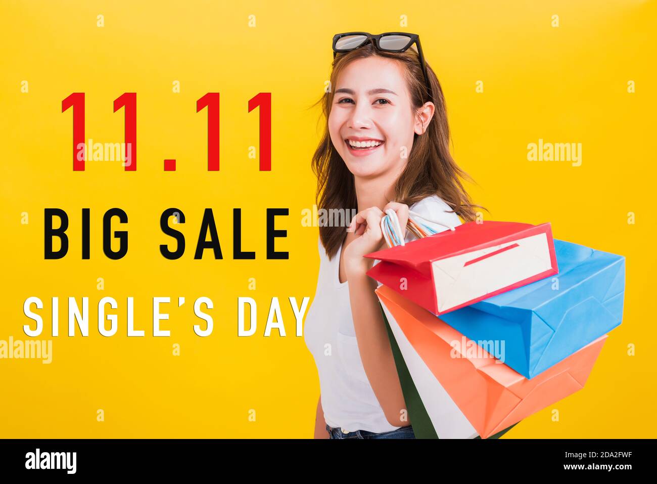 Smiling Young Woman Clothing Store Clearance Day Stock Photo by