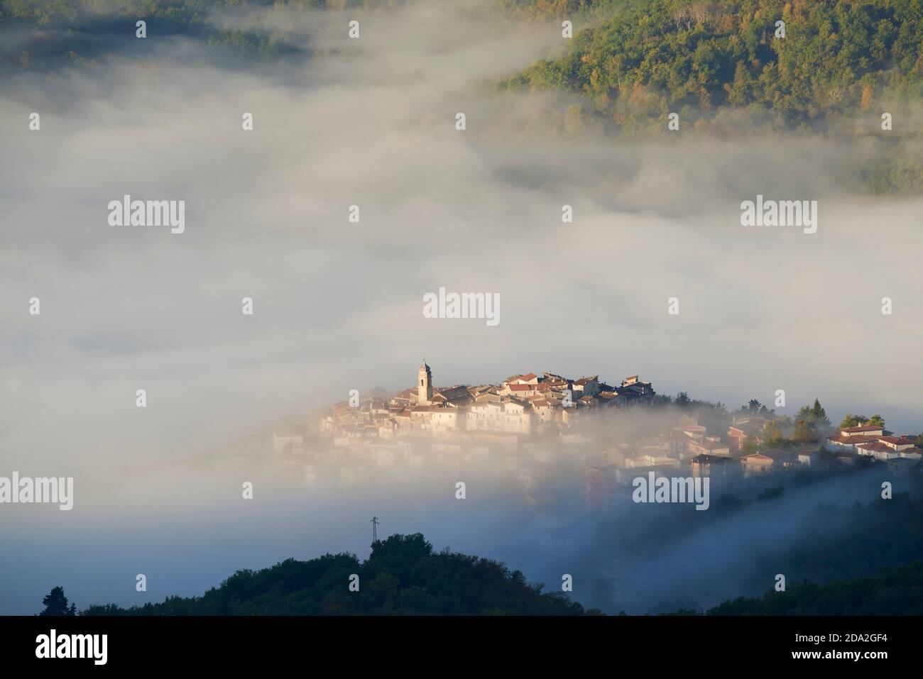the village of Affile in the fog. Aniene Valley Stock Photo