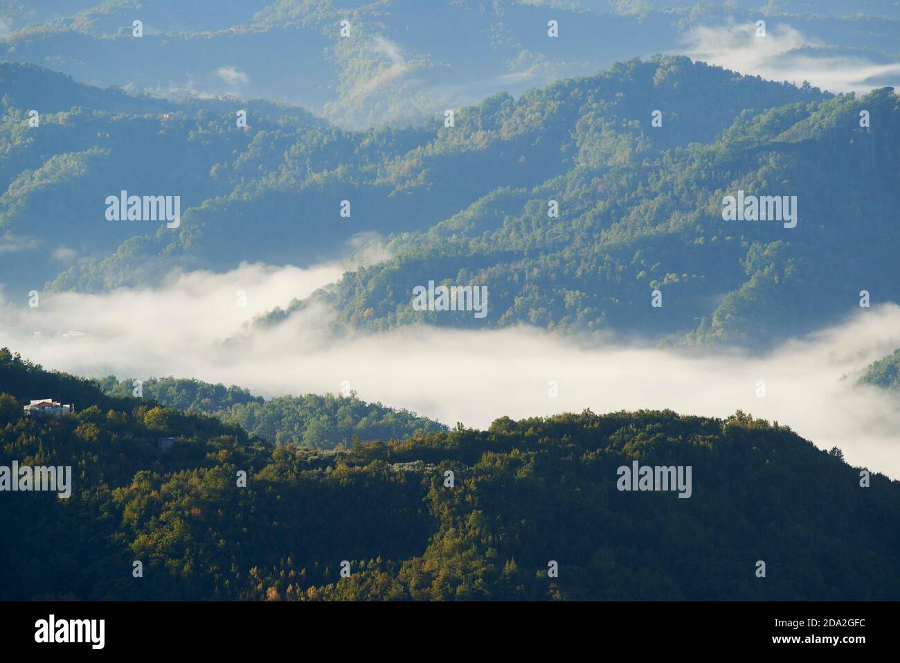 the Aniene valley in the fog seen from Cervara di Roma Stock Photo