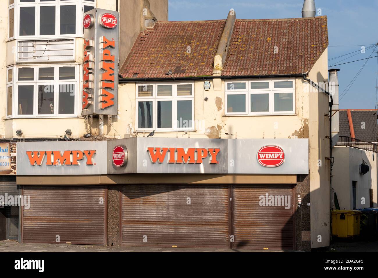 Closed Wimpy restaurant in Southend on Sea, Essex, UK. Shutters down. Decaying building, during COVID 19 Coronavirus lockdown Stock Photo