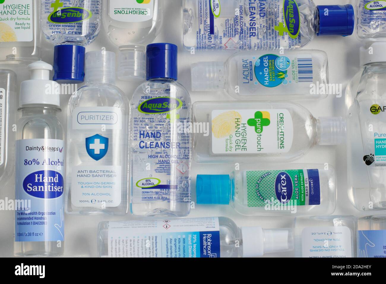 Hand sanitizer. Selection of plastic bottles containing hand sanitiser with varying alcohol content. UK Stock Photo