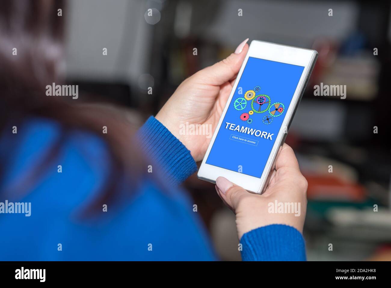 Smartphone screen displaying a teamwork concept Stock Photo - Alamy