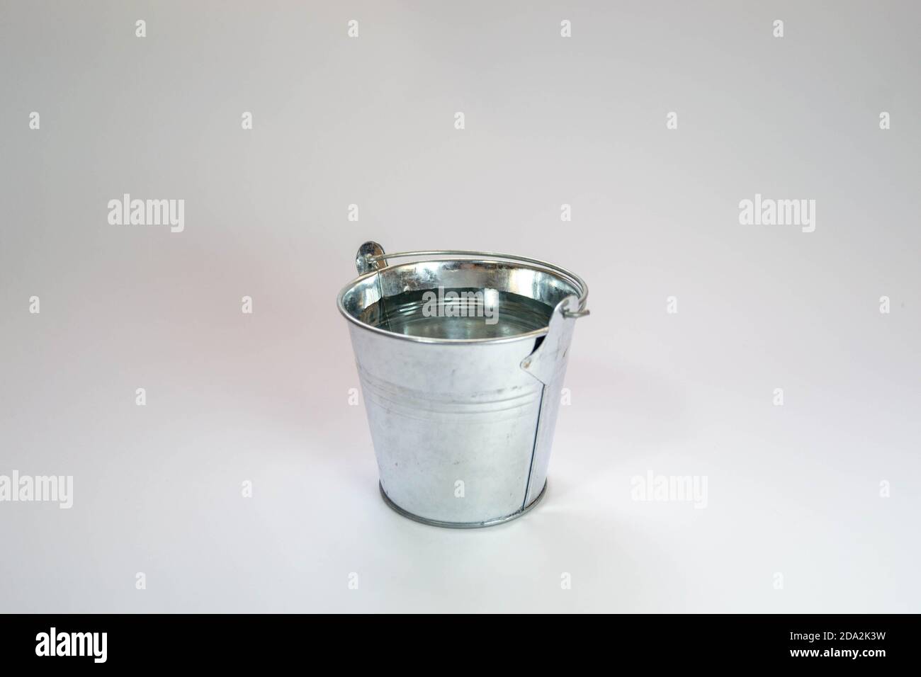 bucket full of water Stock Photo - Alamy