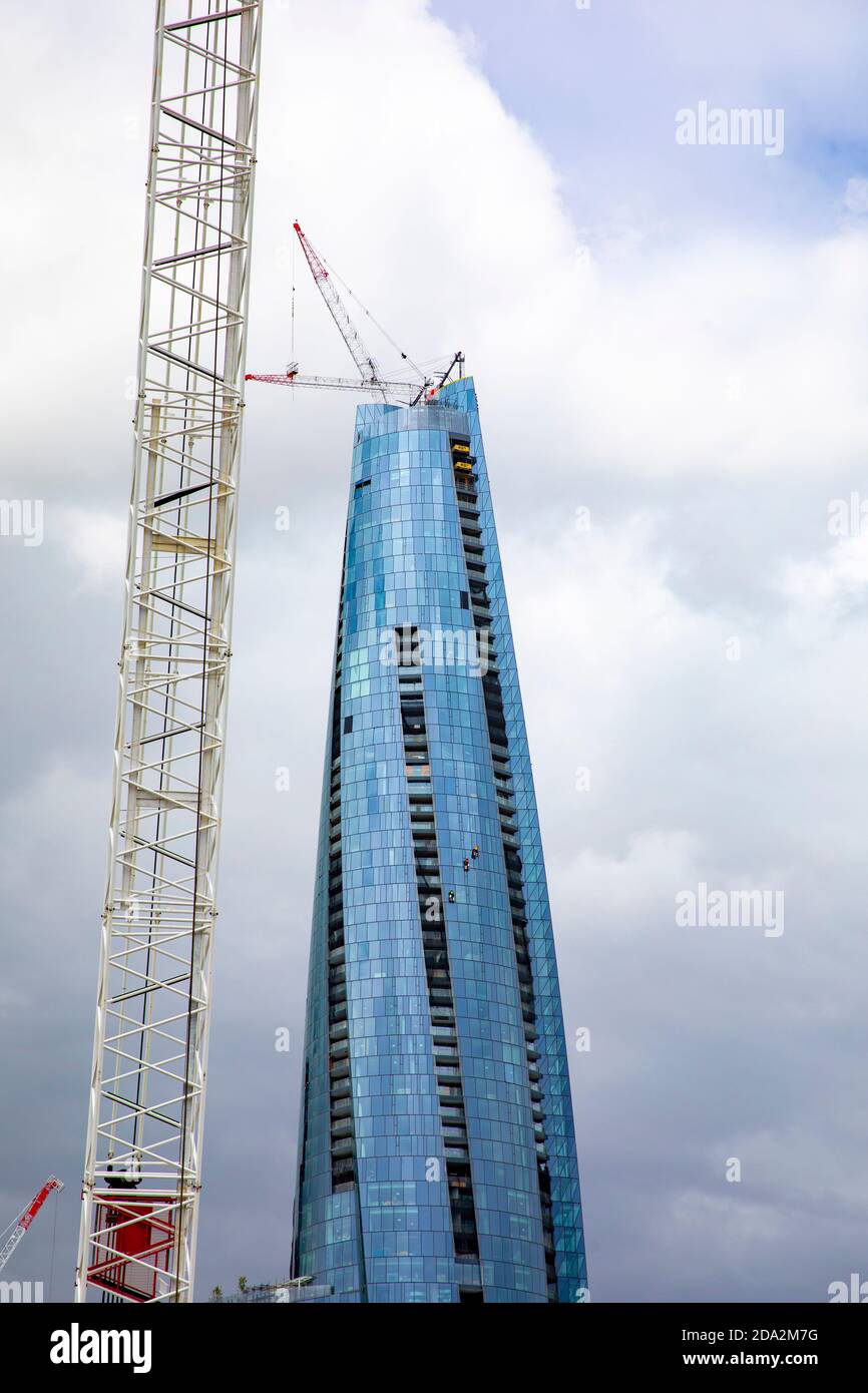 Crown Casino skyscraper building in Barangaroo, Sydney,Australia with construction crane Stock Photo