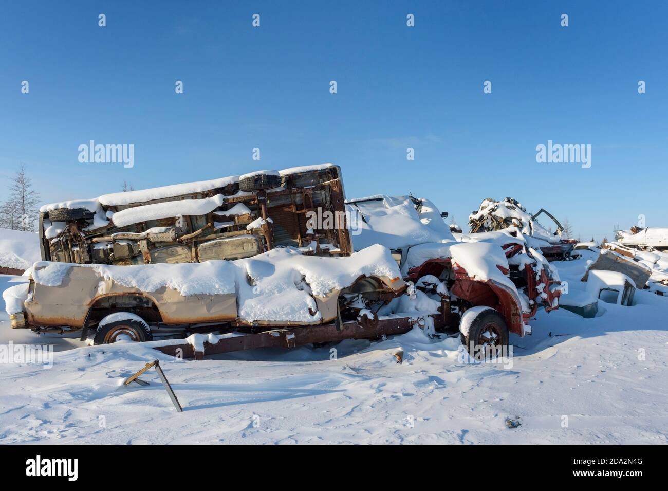 Old car remains on dump, during winter, Town of Churchill, Manitoba, Canada. Stock Photo