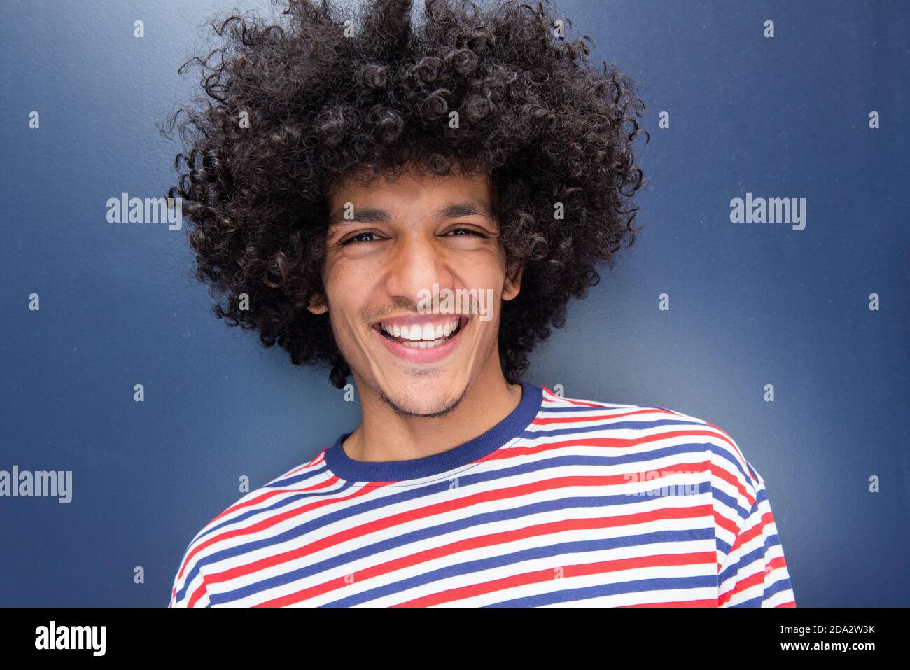 Young arabic man blue hi-res stock photography and images - Alamy