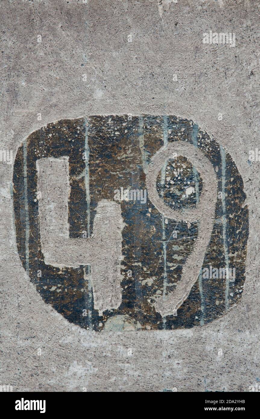 The Number 49 Etched On The External Wall Of A Building Stock Photo