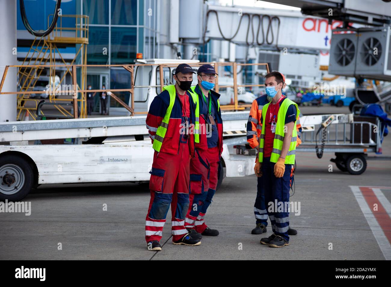 Masked Workers Ukraine, Kyiv - July 8, 2020: Masked people. The man works during ...