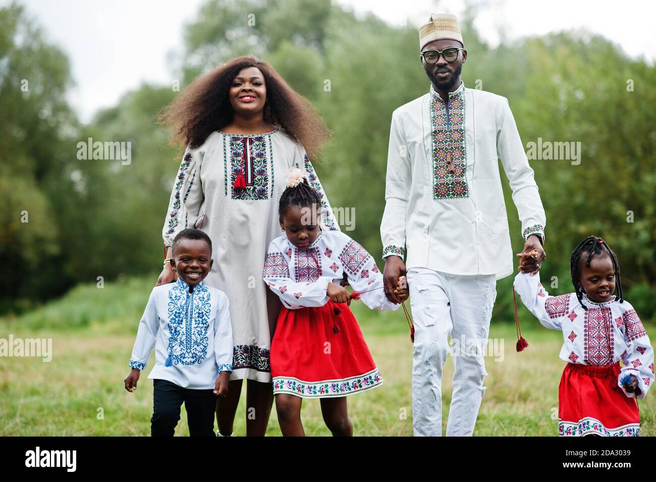 African family in traditional clothes at park Stock Photo Alamy