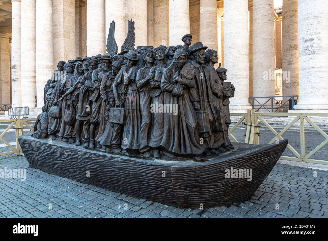 A statue for migrants in St. Peter's Square. Vatican City, Rome, Lazio, Italy, Europe Stock Photo
