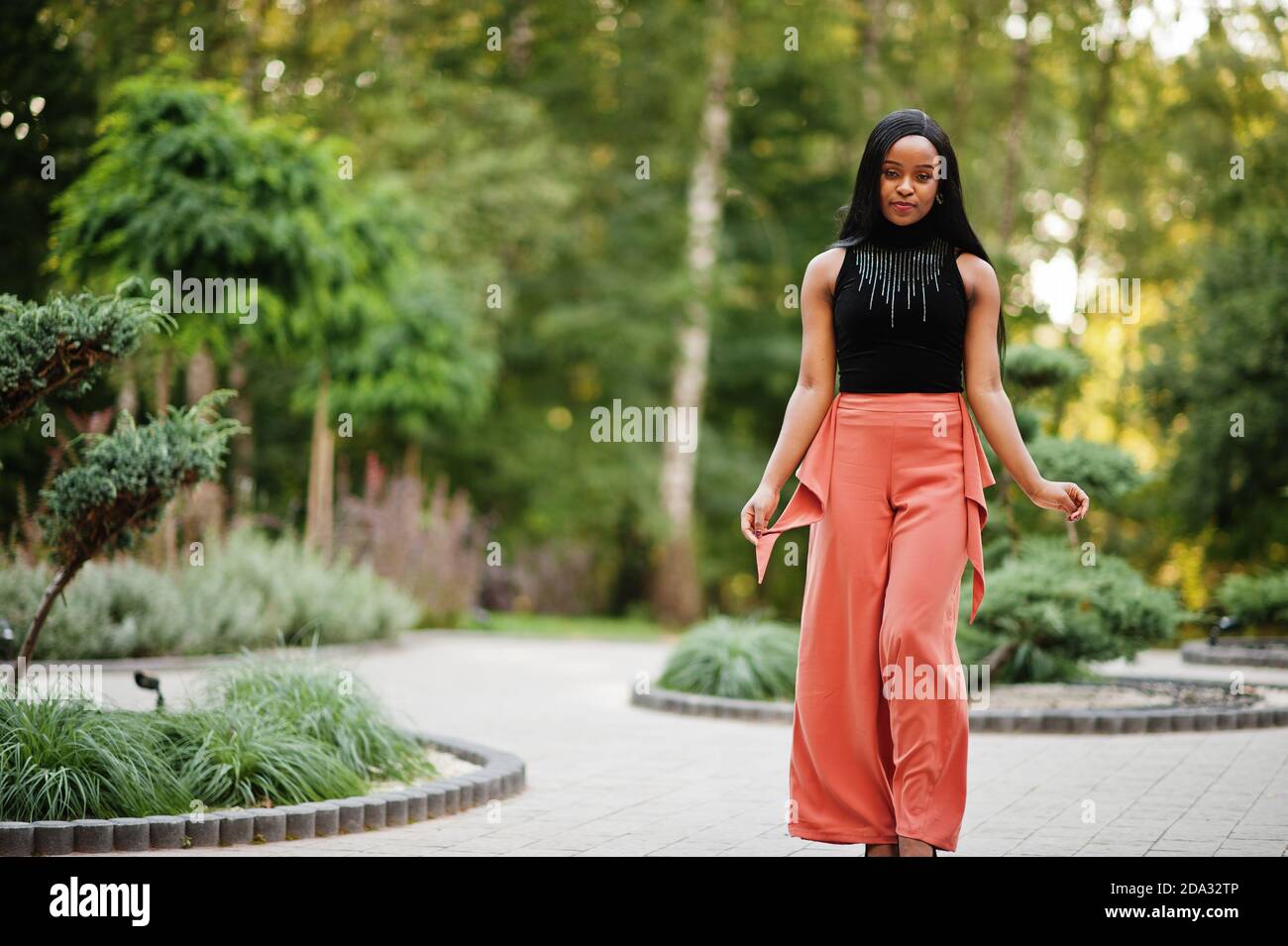 Peach pants hi-res stock photography and images - Alamy