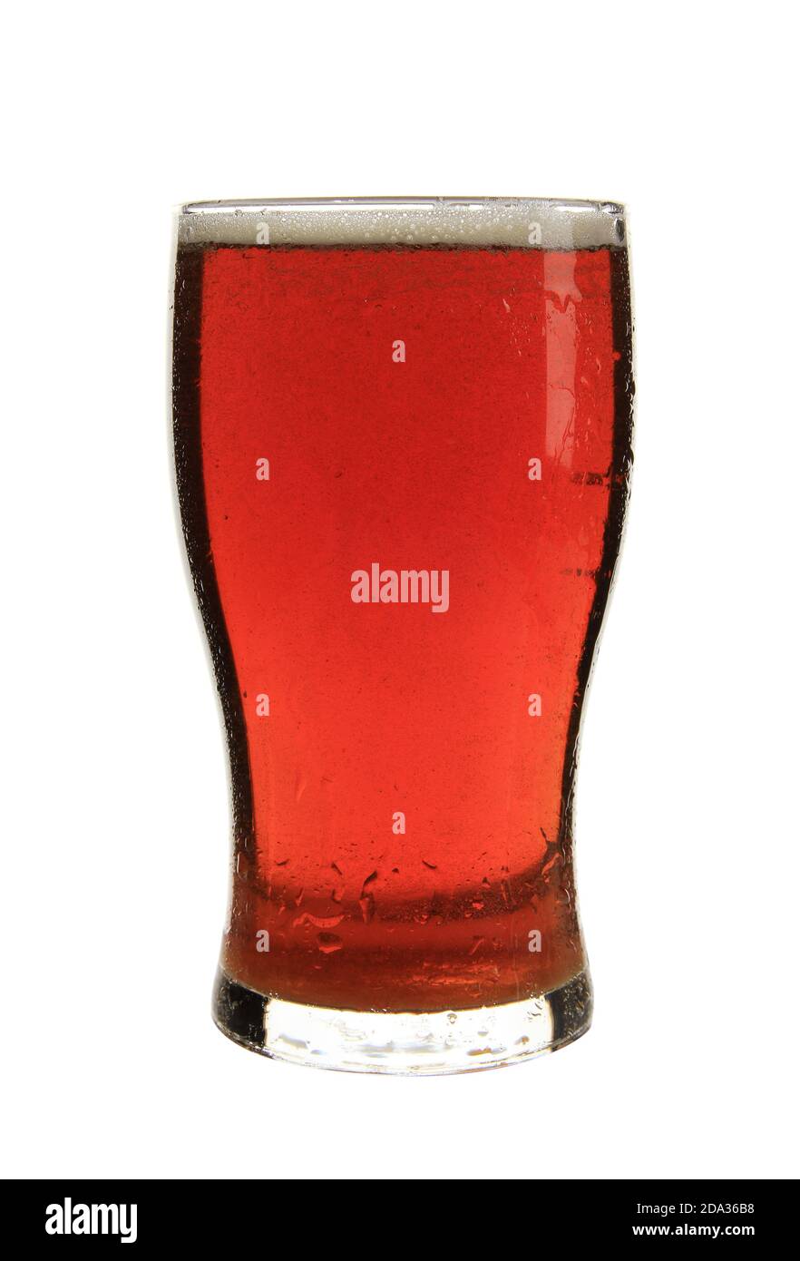 Vertical shot of a glass of Irish red ale beer isolated on white