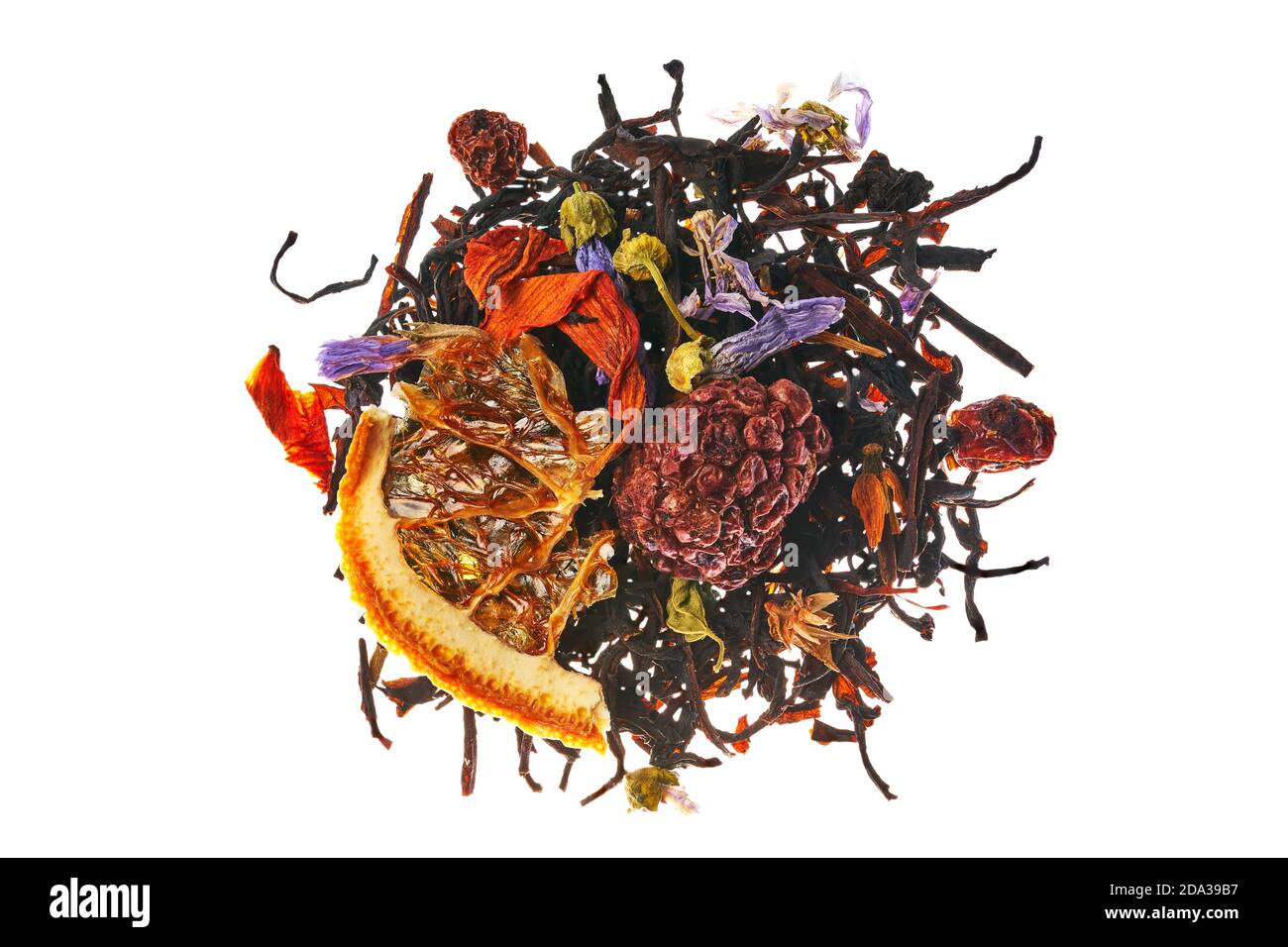 Assam Dikom with Lily petals, forget-me-nots, orange slices, red currant berries Stock Photo