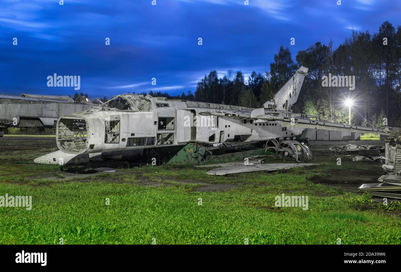 Abandoned Russian military aircraft on the runway of an airbase Stock Photo