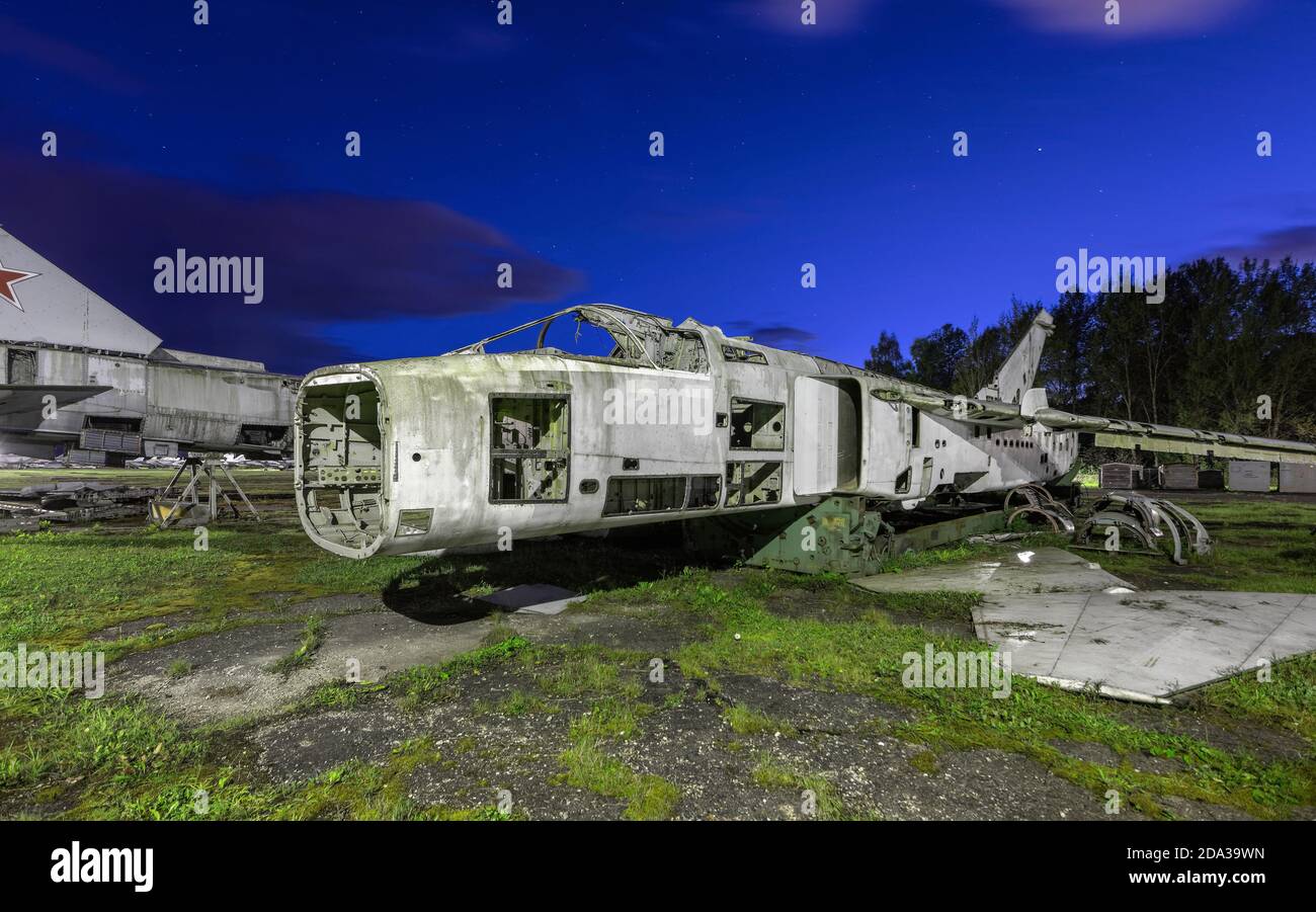 Abandoned Russian military aircraft on the runway of an airbase Stock Photo