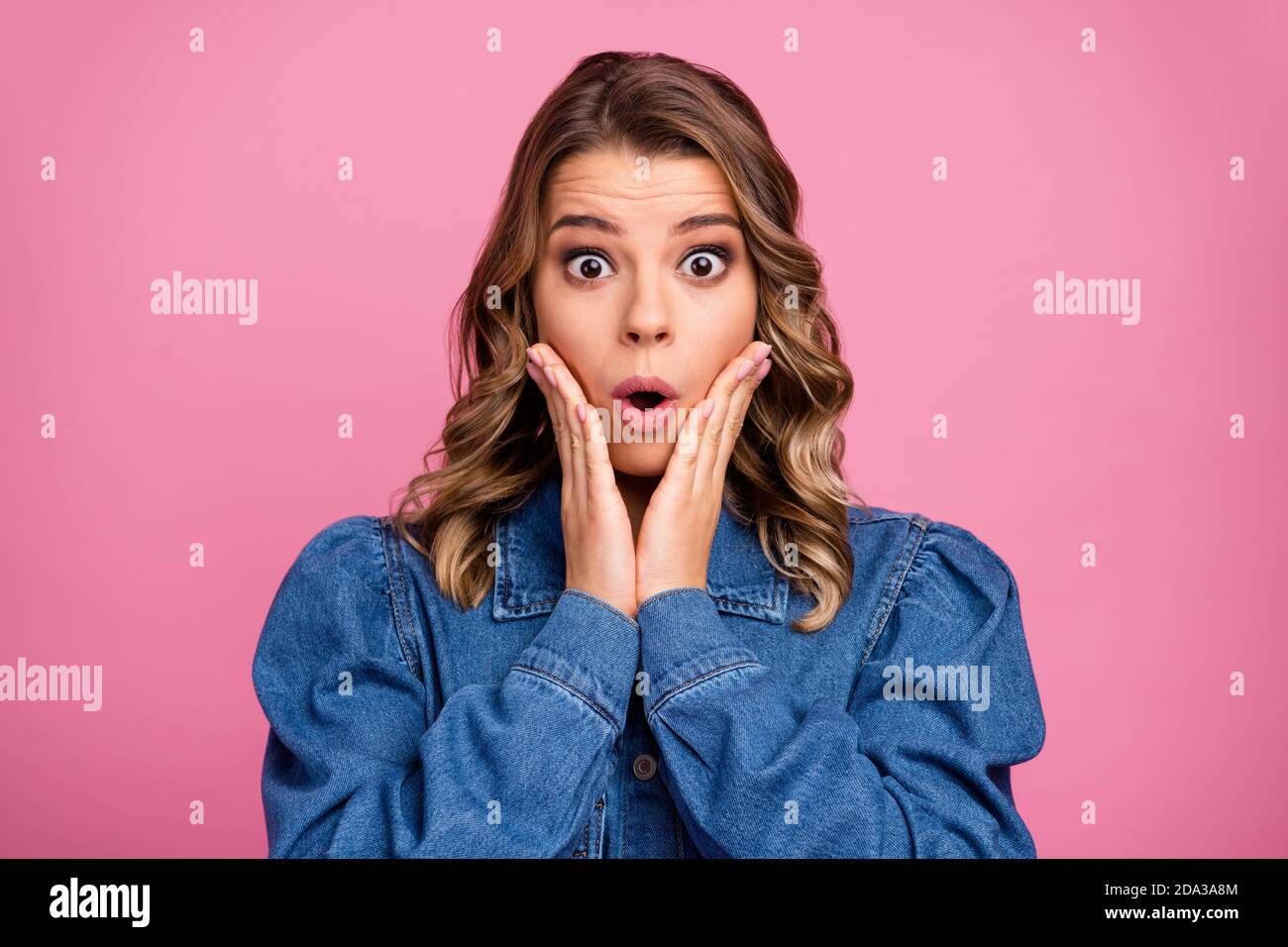 Close up photo of astonished girl touch hands face wear good look ...