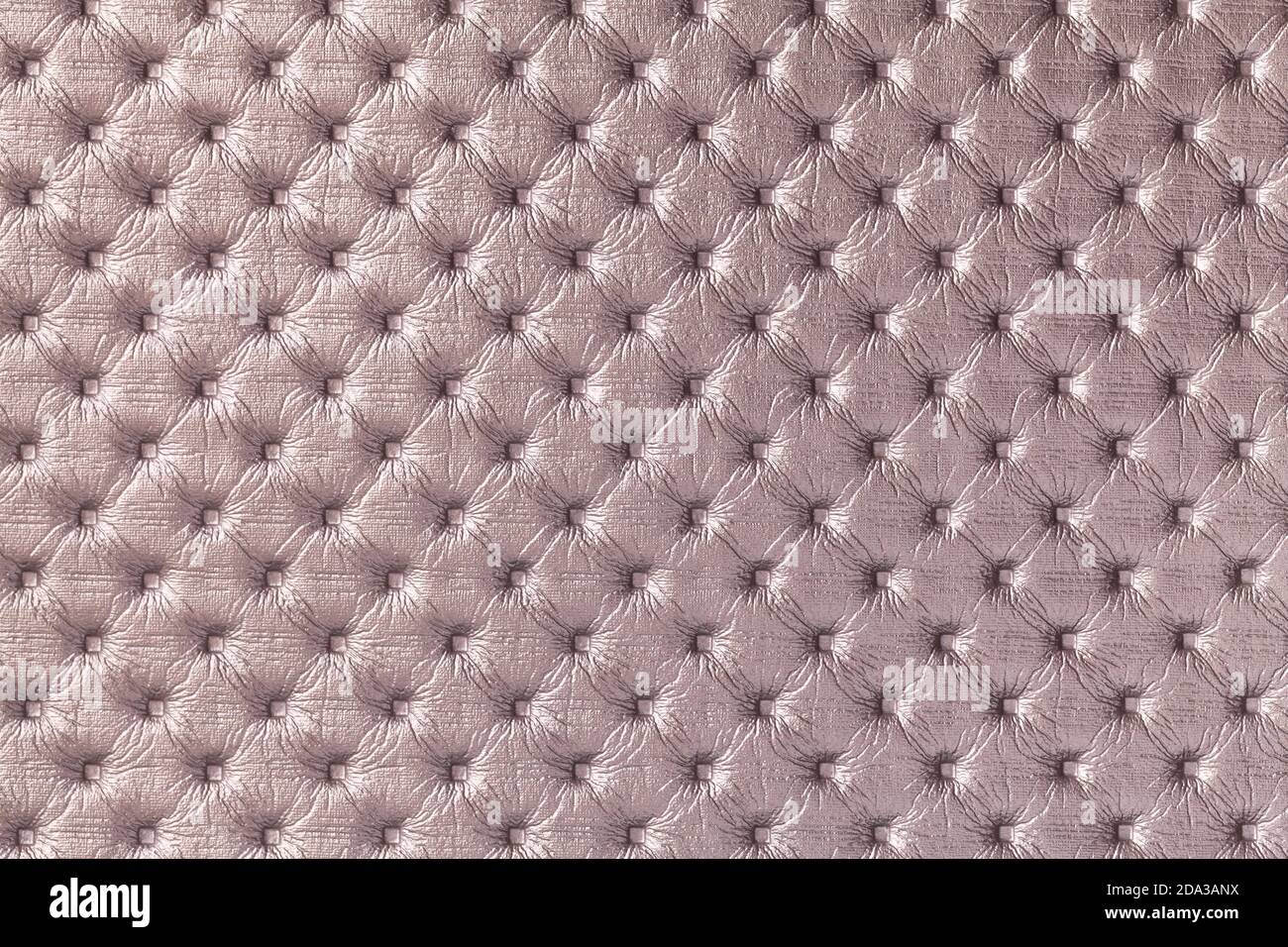 Texture of light brown leather background with capitone pattern, macro ...