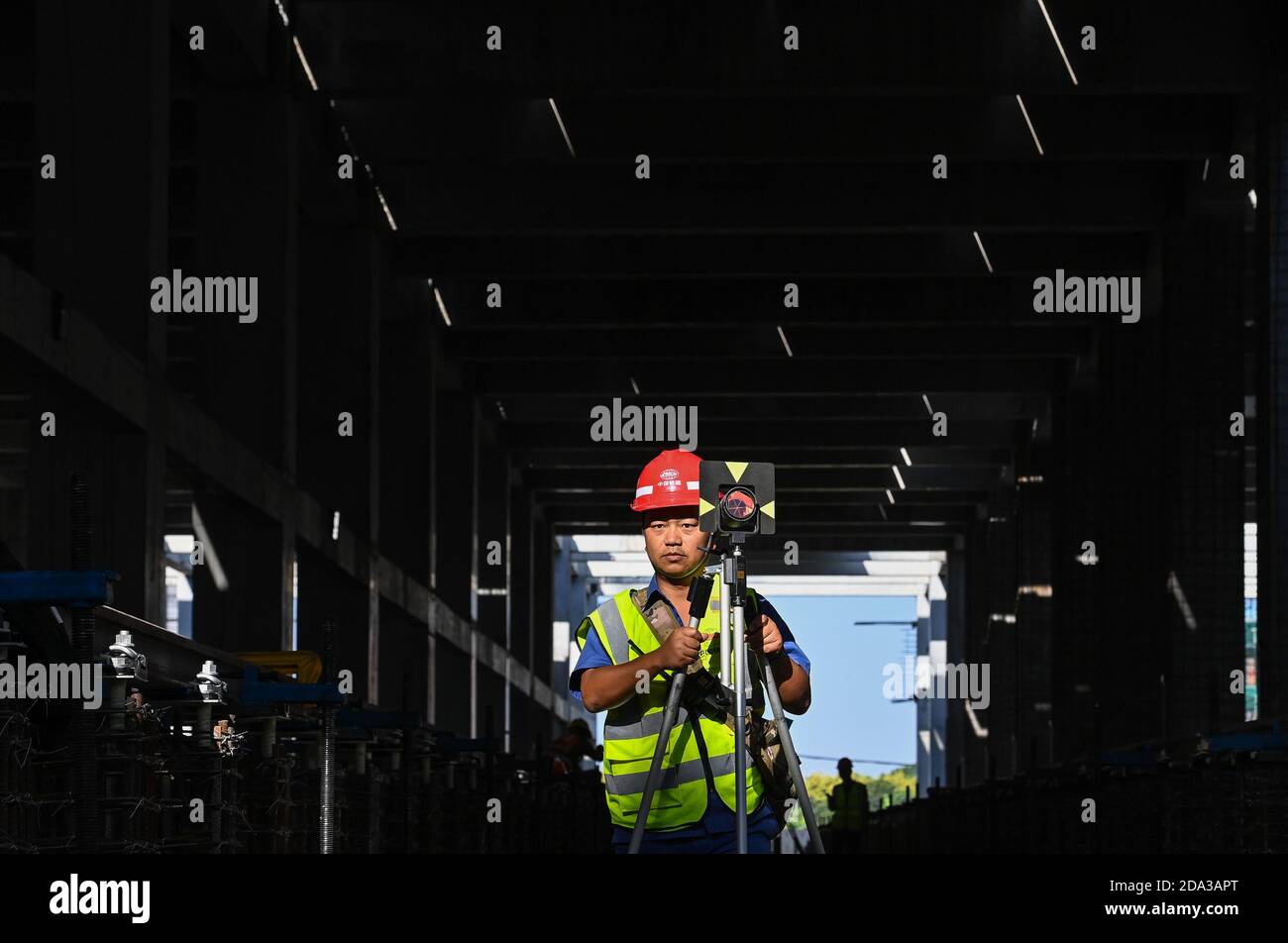 201109 Guangzhou Nov 9 2020 Xinhua A Builder Works At The Construction Site Of The Longzhen Train Depot Of Guangzhou Metro Line 18 In Guangzhou South China S Guangdong Province Nov