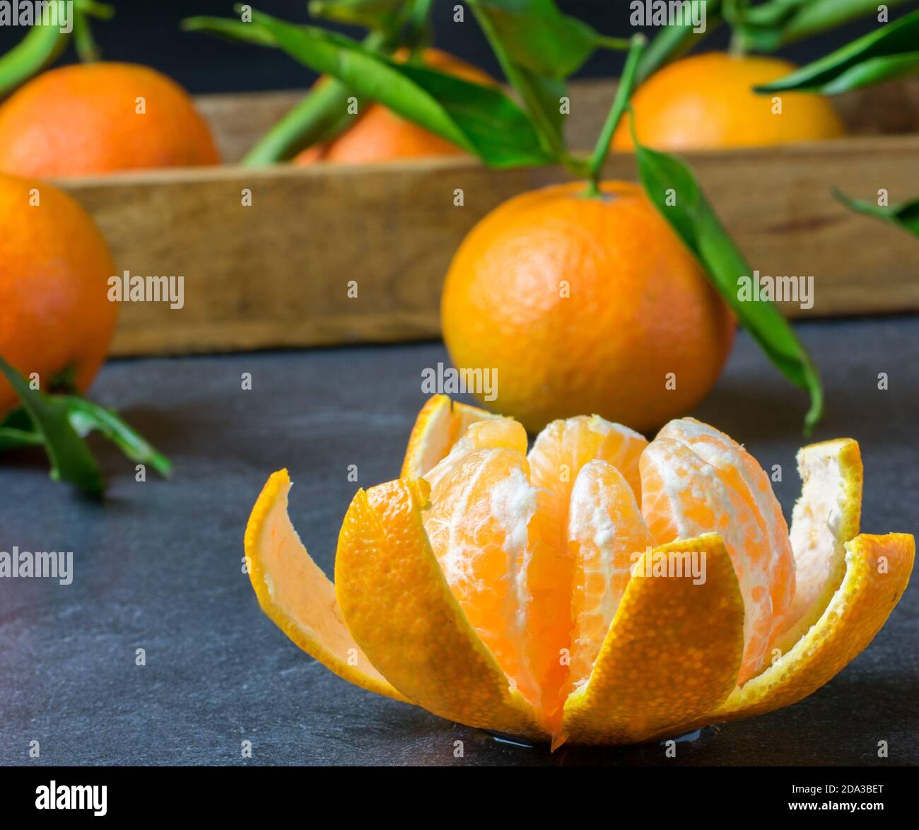 fresh peeled tangarine on a table Stock Photo