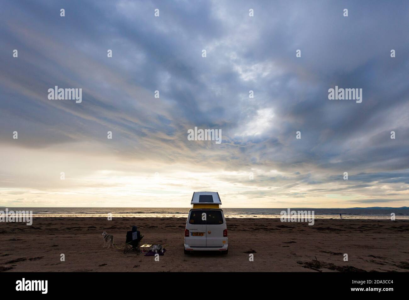 Morfa Bychan, North Wales, UK 9th November 2018, UK Weather: Warm temperatures on the North Wales coast as some head to the coast for the first day out of the Welsh lockdown or firebreak. A view of a VW Campervan towards to the sea at Morfa Bychan on the first day out of lockdown for this beach goer in North Wales  © DGDImages/Alamy Live News Stock Photo