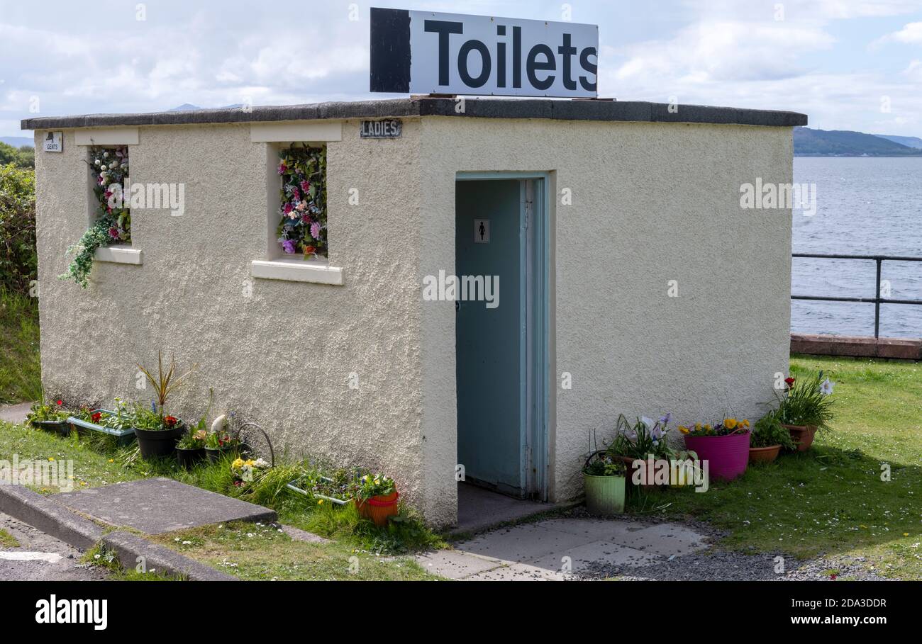 Public toilets on the coast road B896 at Fintray Bay on the Island of Great Cumbrae, Firth of Clyde, Scotland, UK Stock Photo