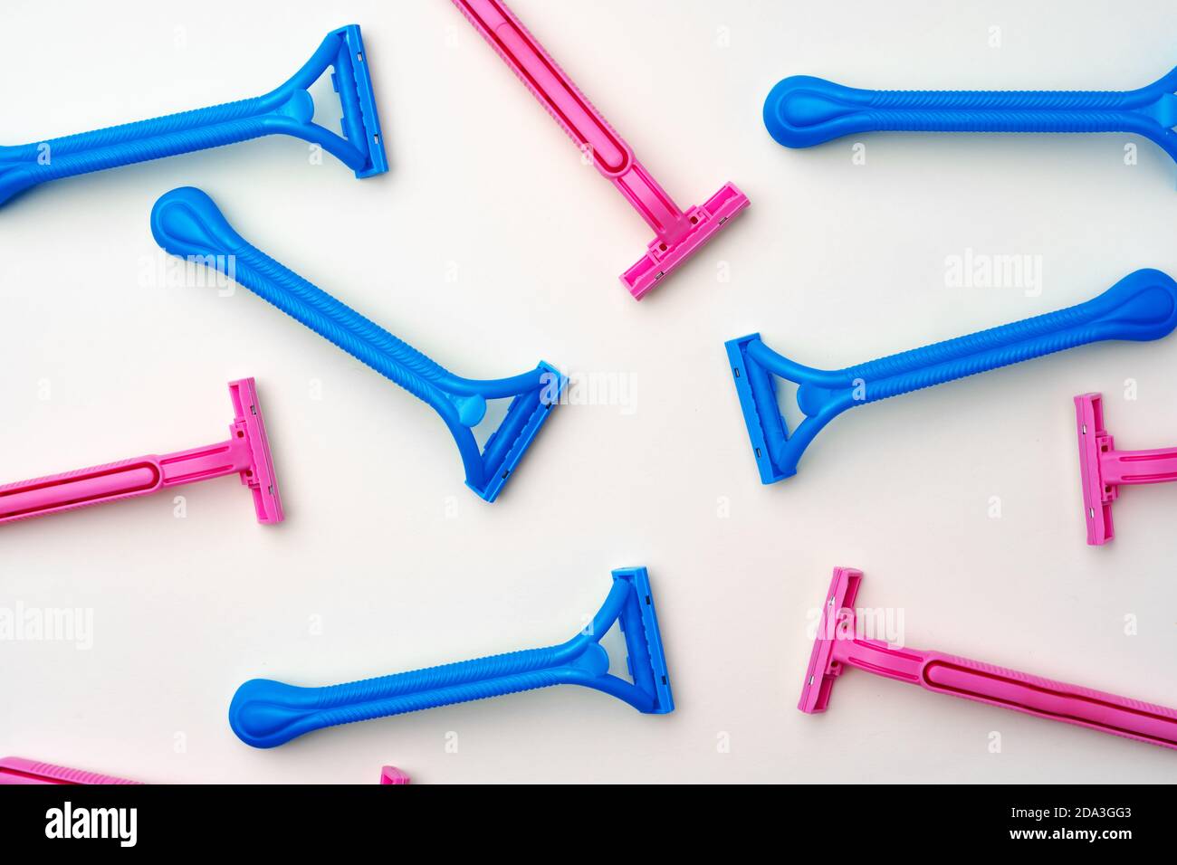 Pink and blue razors on white background Stock Photo