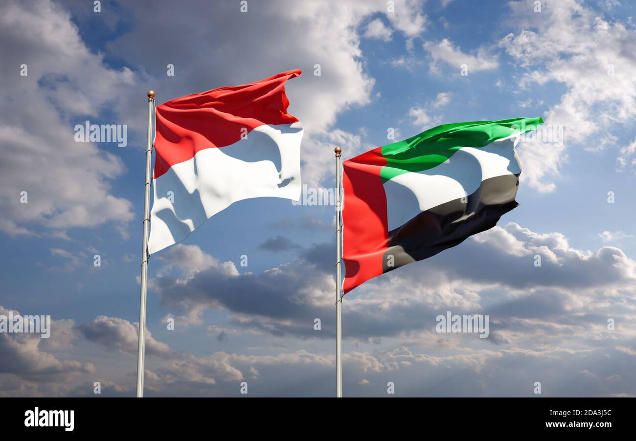 Beautiful national state flags of Indonesia and UAE United Arab Emirates together at the sky background. 3D artwork concept. Stock Photo