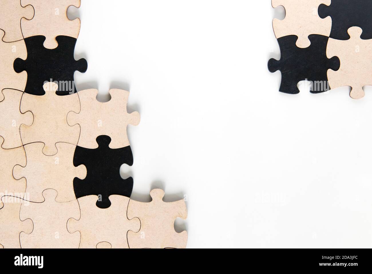 Wooden jigsaw puzzle pieces on white background Stock Photo - Alamy