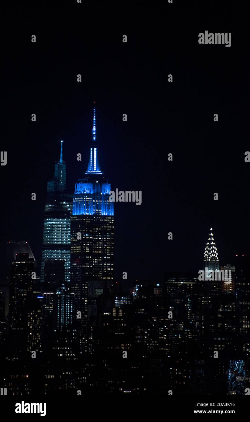 Empire State Building in blue light the night after Election Day 2020. Stock Photo