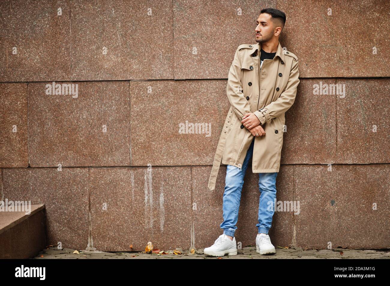 Stylish kuwaiti man at trench coat. Stock Photo