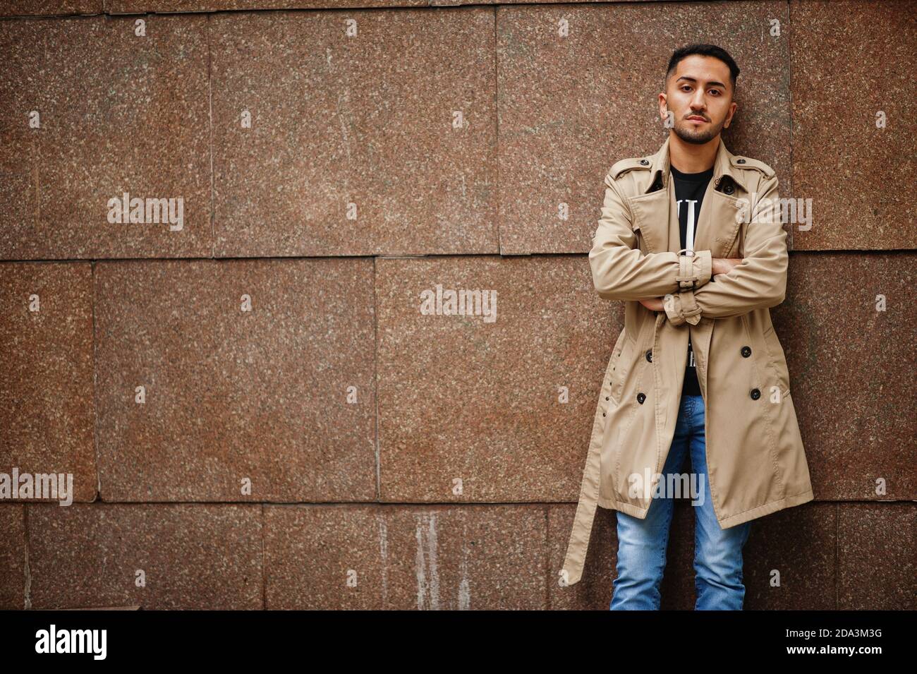 Stylish kuwaiti man at trench coat. Stock Photo