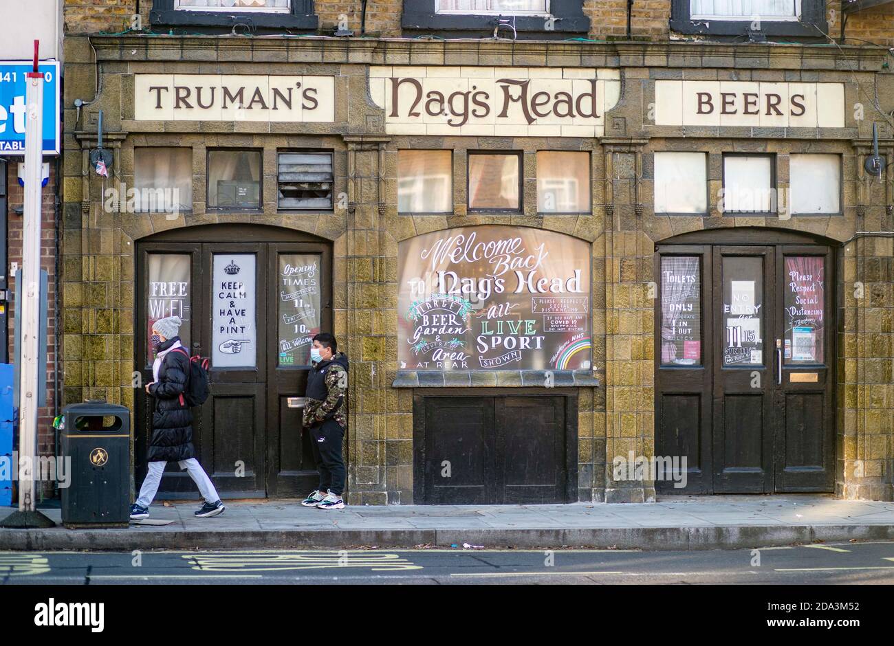 The Nags Head and The Joiners pubs in Camberwell closes for lockdown with bar stools stacked on tables in the window   Closed due to the pandemic Stock Photo