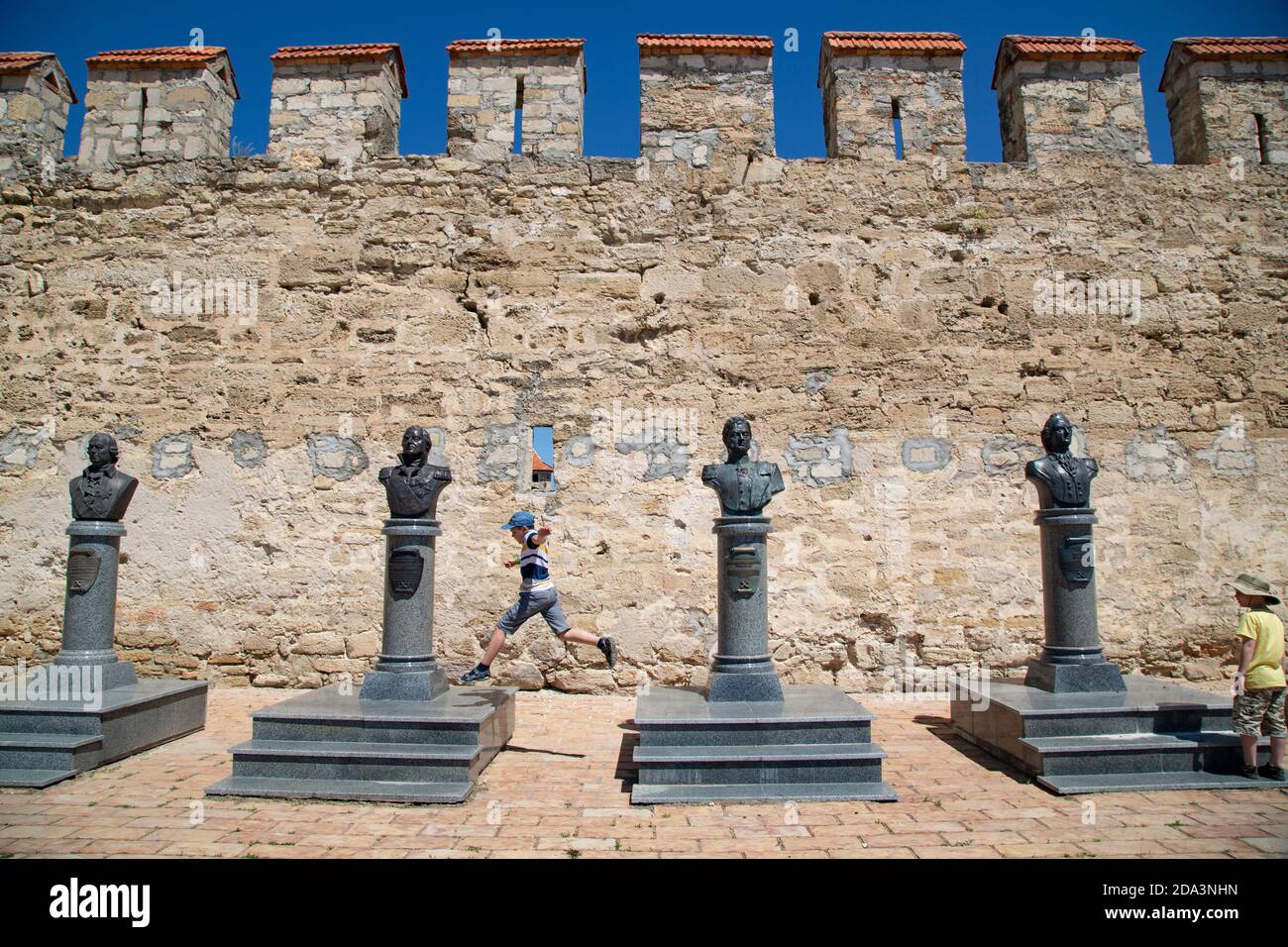 Busts of Transnistrian heroes stand outside the 16th century Ottoman fortress in Bender, Moldova in Pridnestrovian Moldavian Republic (Transnistria). Stock Photo