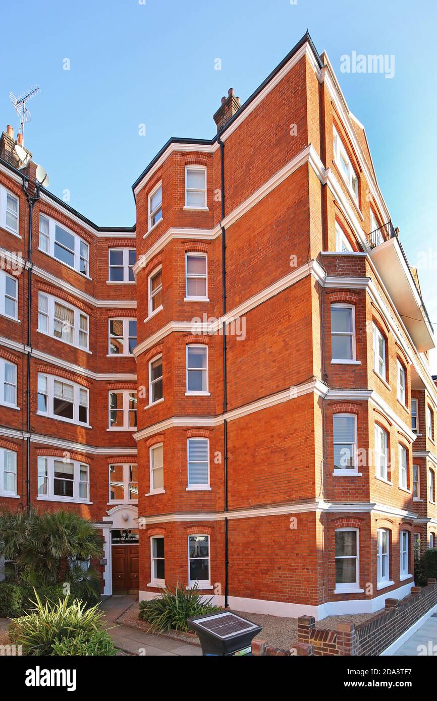 Exterior view of Albert Palace Mansions, a newly refurbished Victorian tenement block of luxury flats next to Battersea Park, London, UK Stock Photo