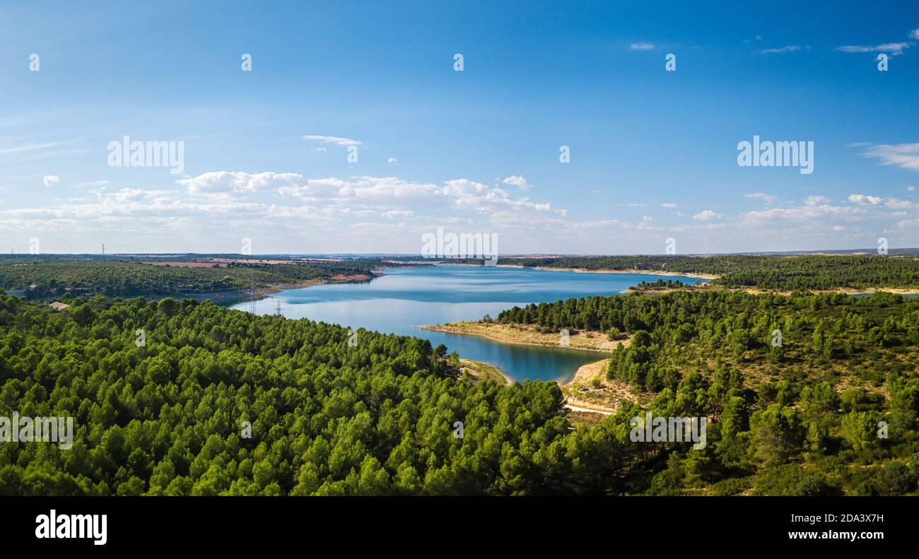 Aerial view of the dam and reservoir on the river Jucar close to the medieval town of Alarcon in Cuenca, Castilla-La Mancha. Stock Photo