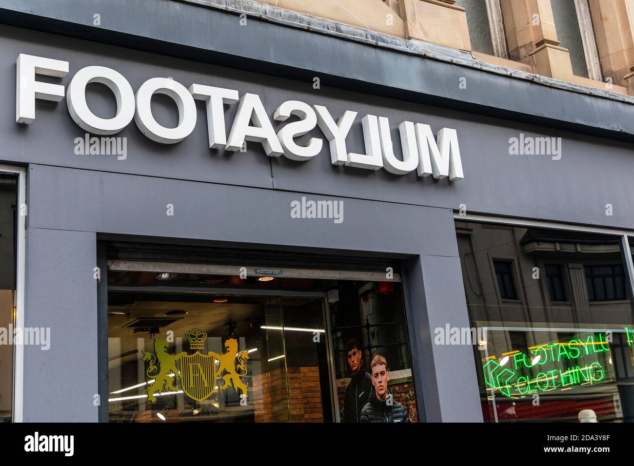 Logo sign for the footwear and clothing retail store Footasylum, Glasgow, UK Stock Photo