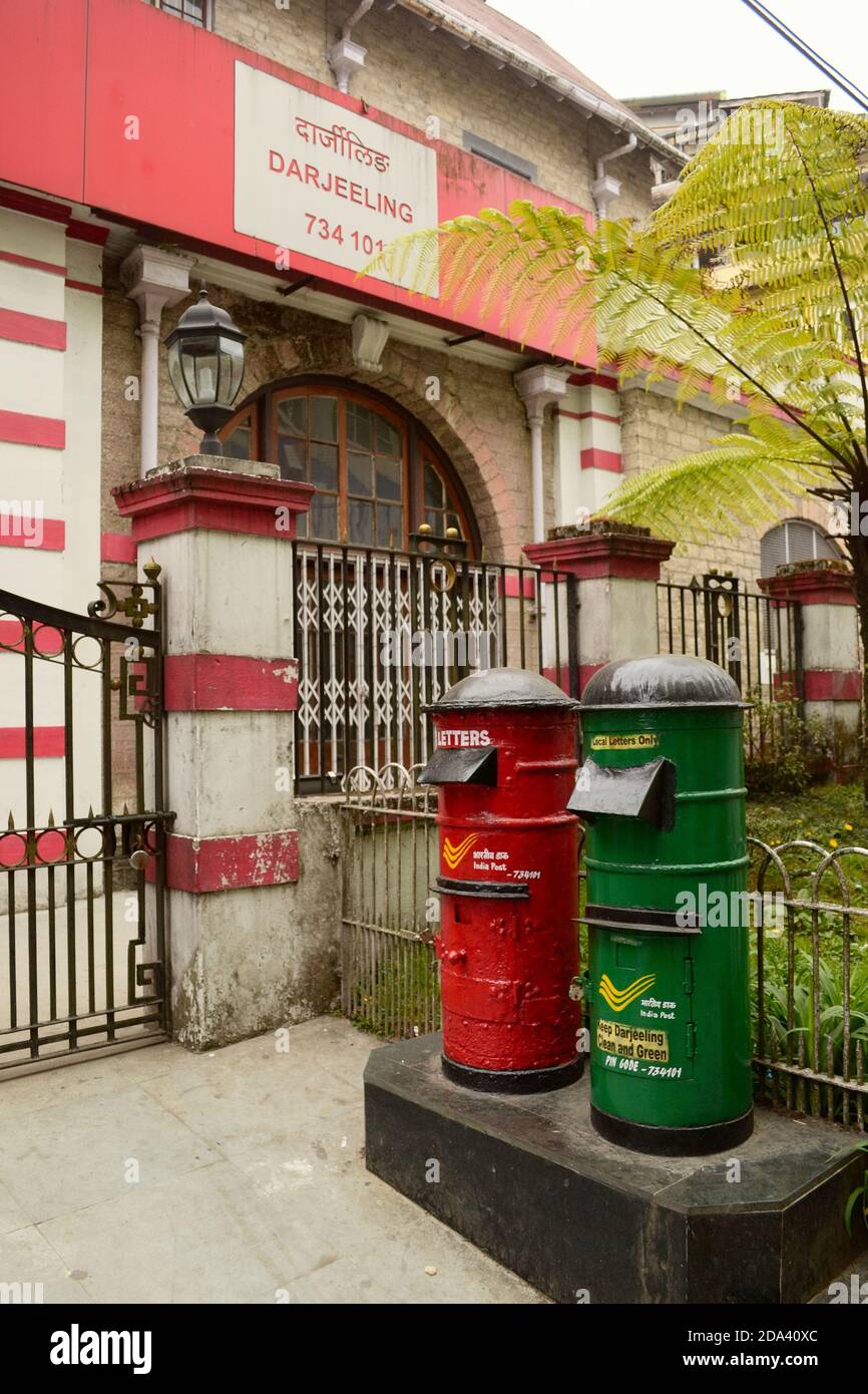 Red and green mailboxes near post office in Darjeeling, India. Stock Photo