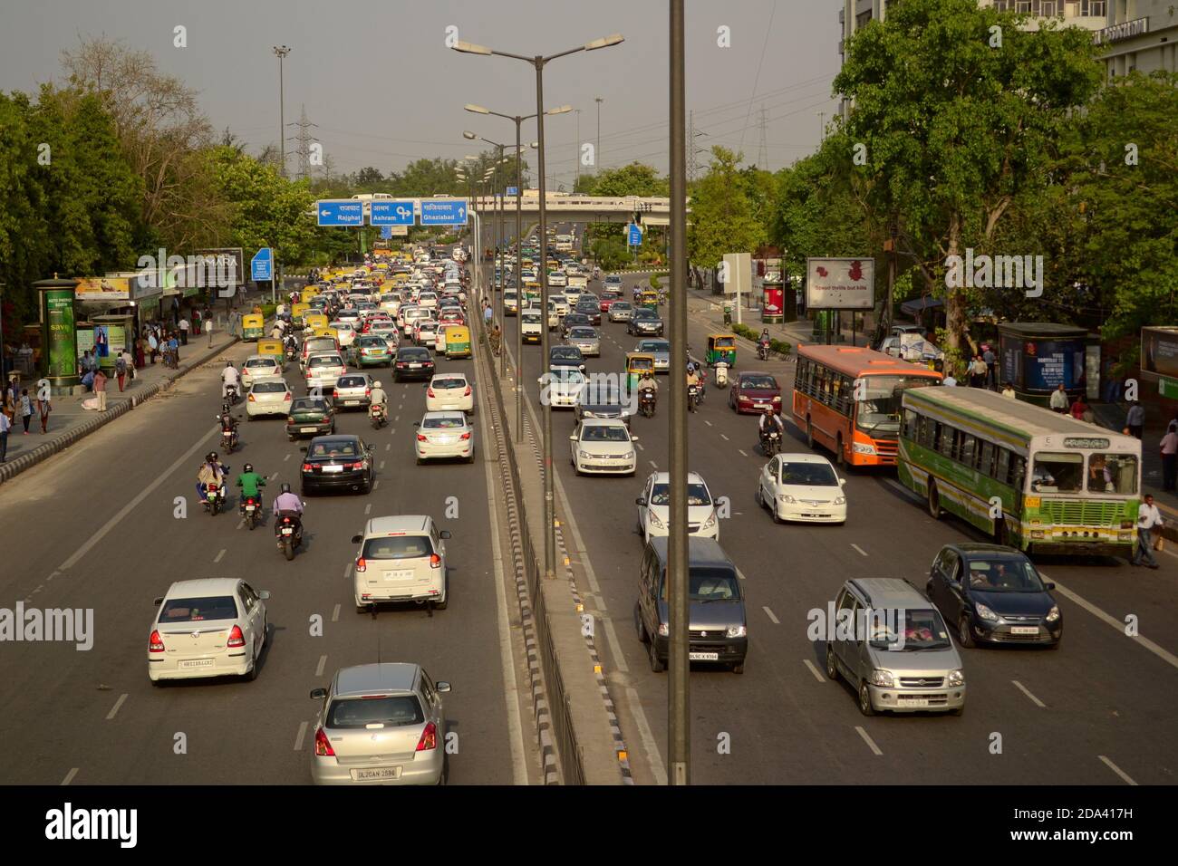 Delhi, India - April, 2014: Traffic jam on the road with cars, buses and other vehicles in rush hour Stock Photo